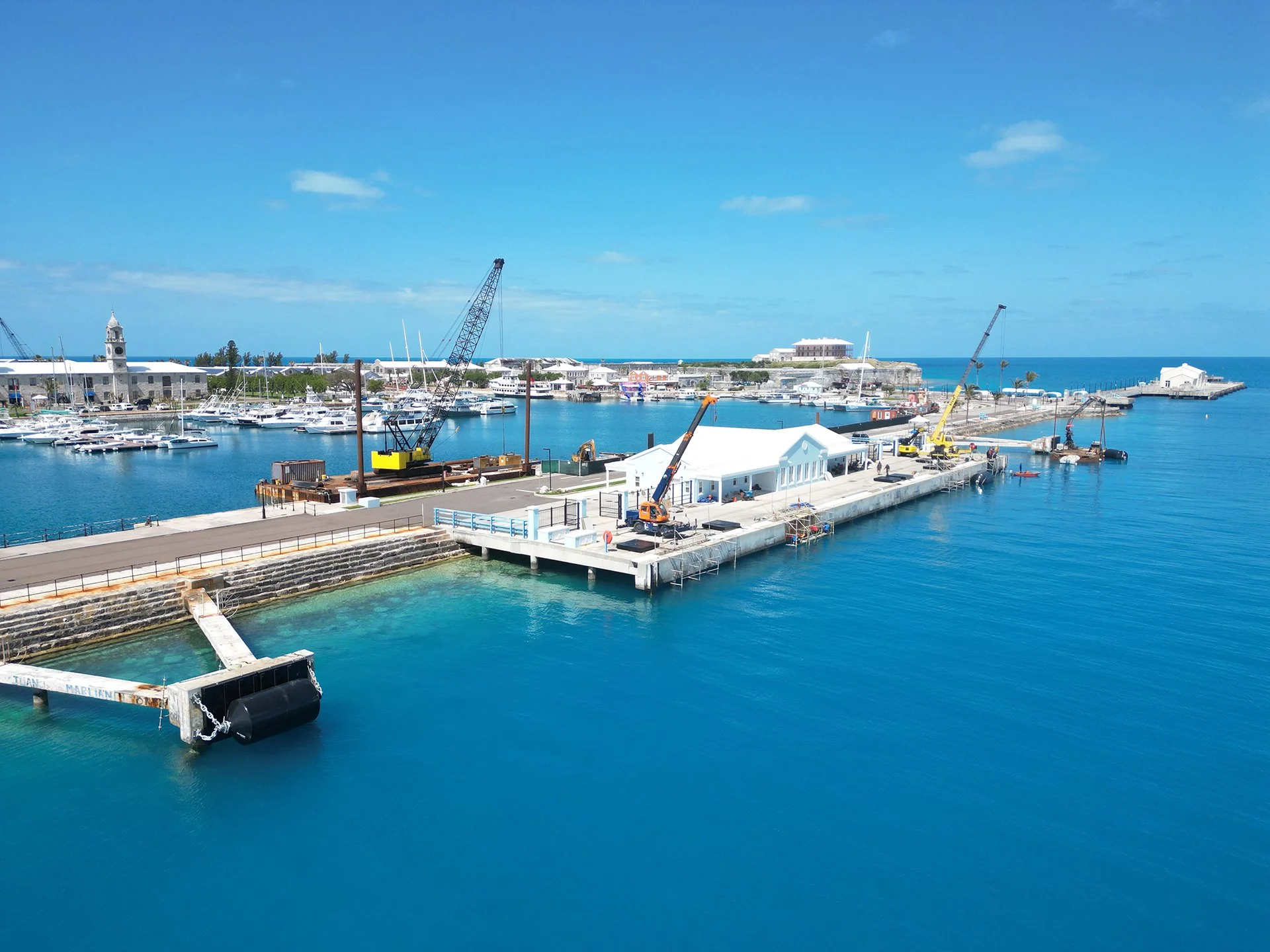 King's Wharf, Bermuda, prior to the wharf expansion project. Cranes are visible during the previous rehabilitation project in 2019.
