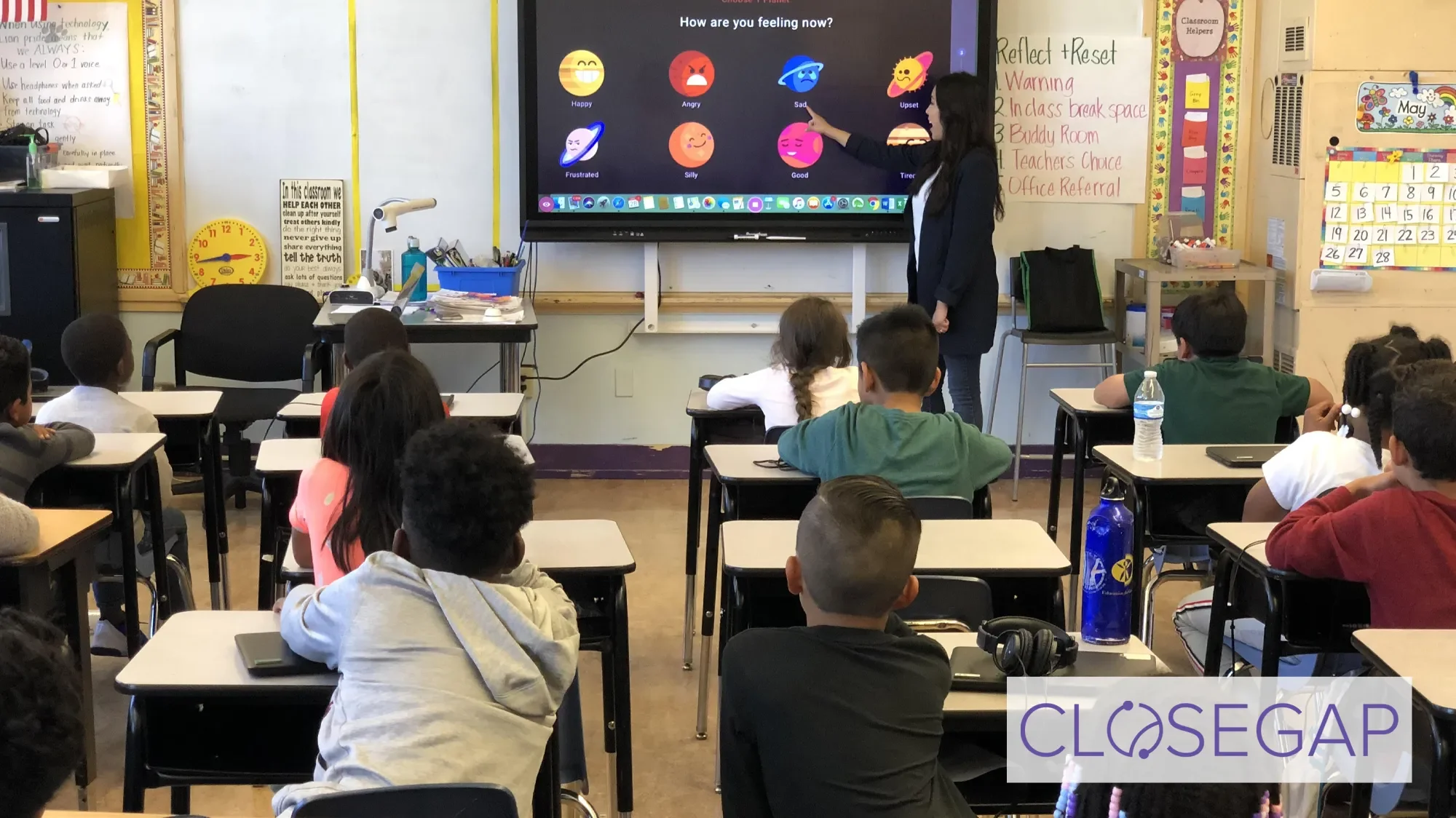 Children in a classroom with digital products