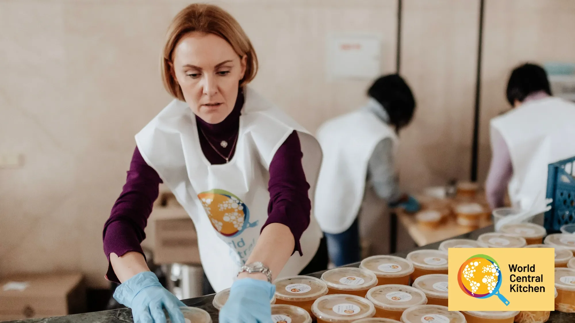Volunteer preparing food