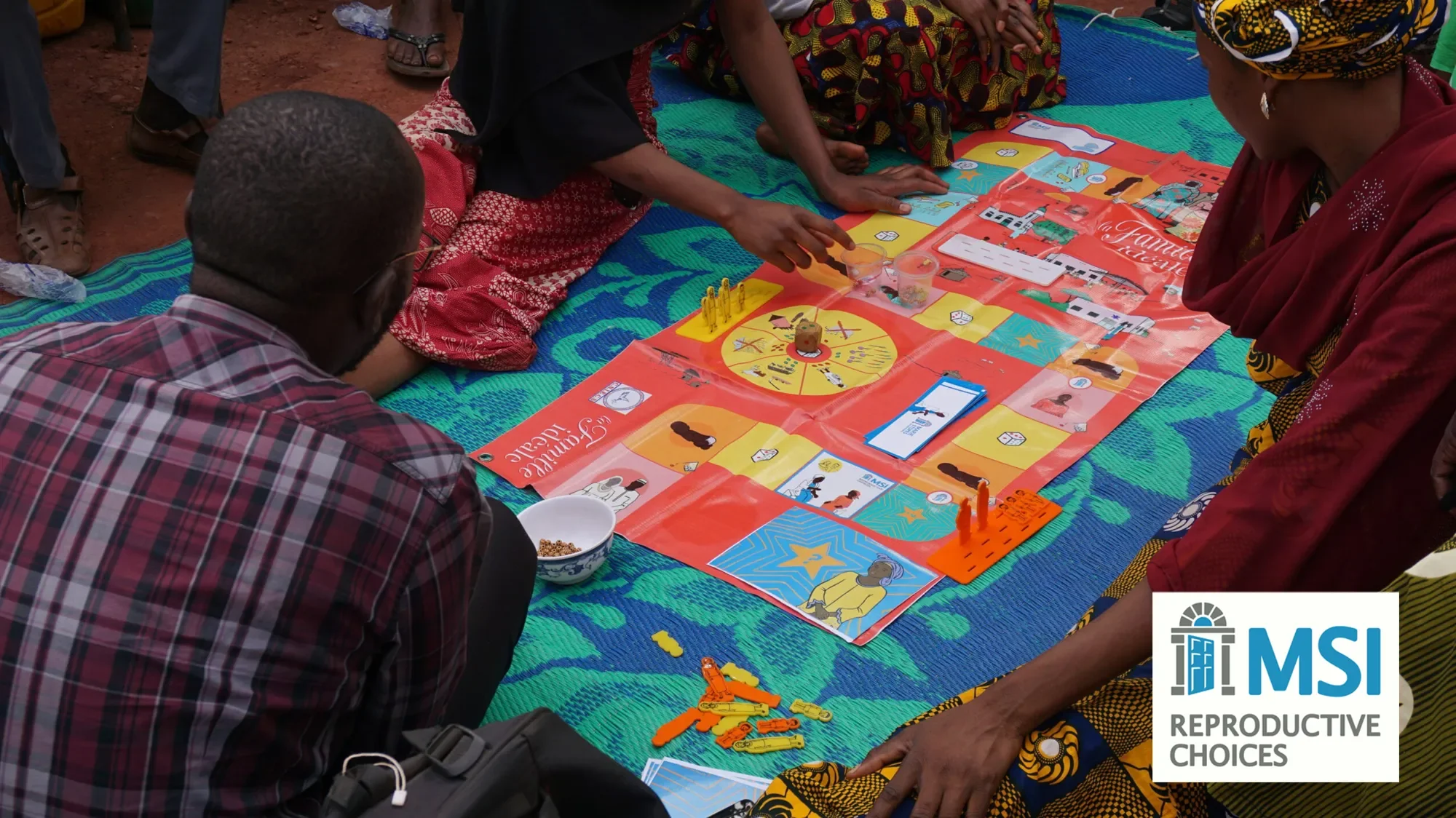 People playing a board game