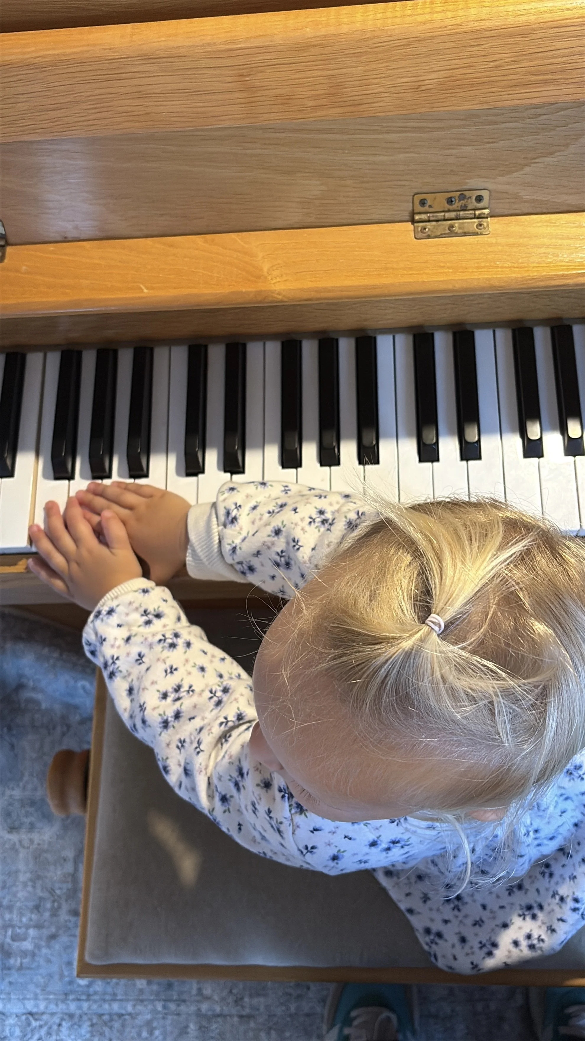 Toddler plays piano baby toddler music classes Alfold Surrey, west Sussex, Mini Musicians