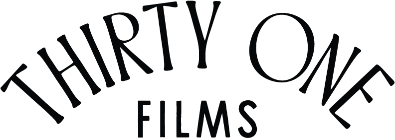 Black background with the text 'Thirty One Films' in large, curved font.