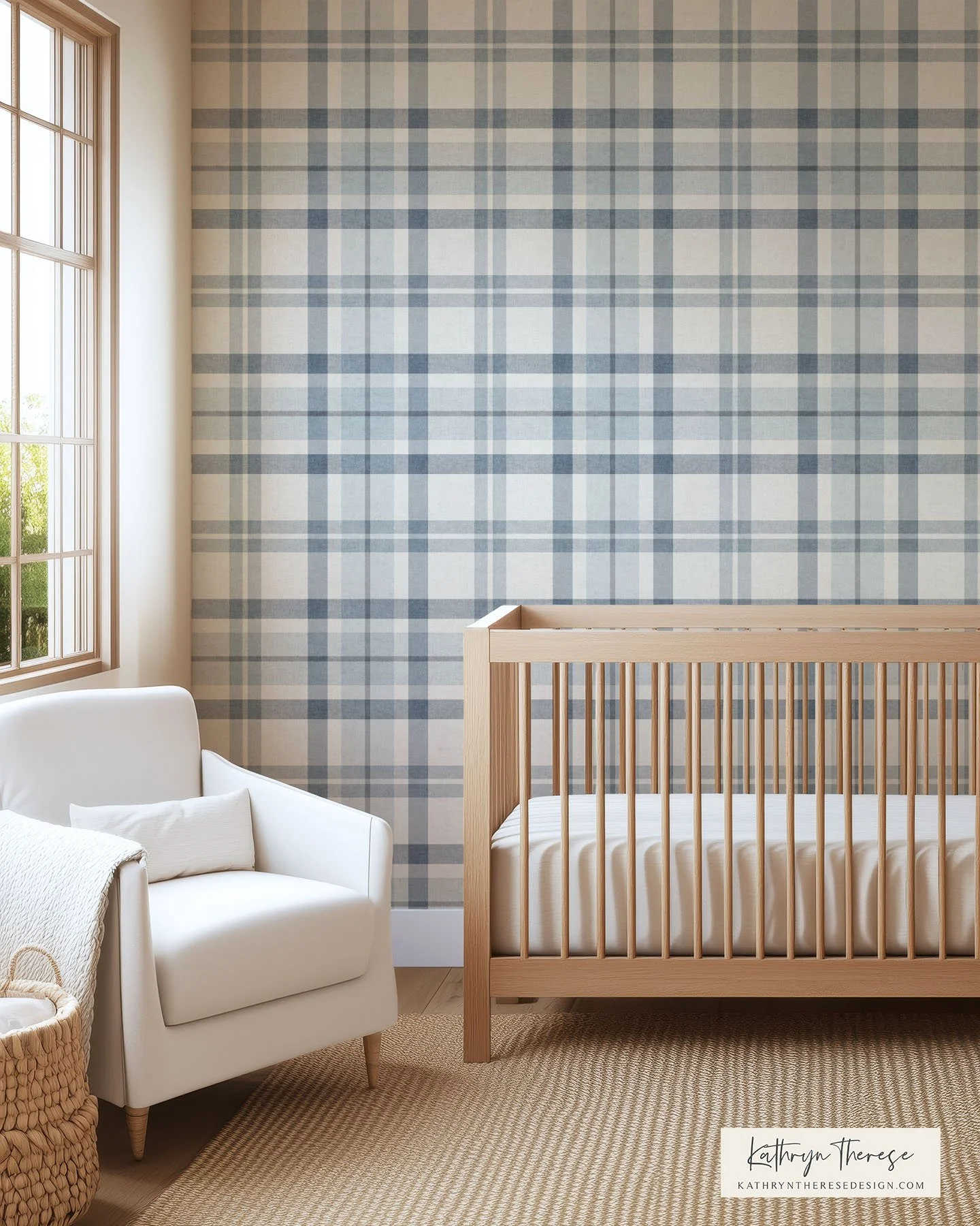 A nursery room with a large plaid-patterned wallpaper in shades of blue and gray, a wooden crib with a white mattress, and a white armchair with a throw pillow near a window with wooden framing.