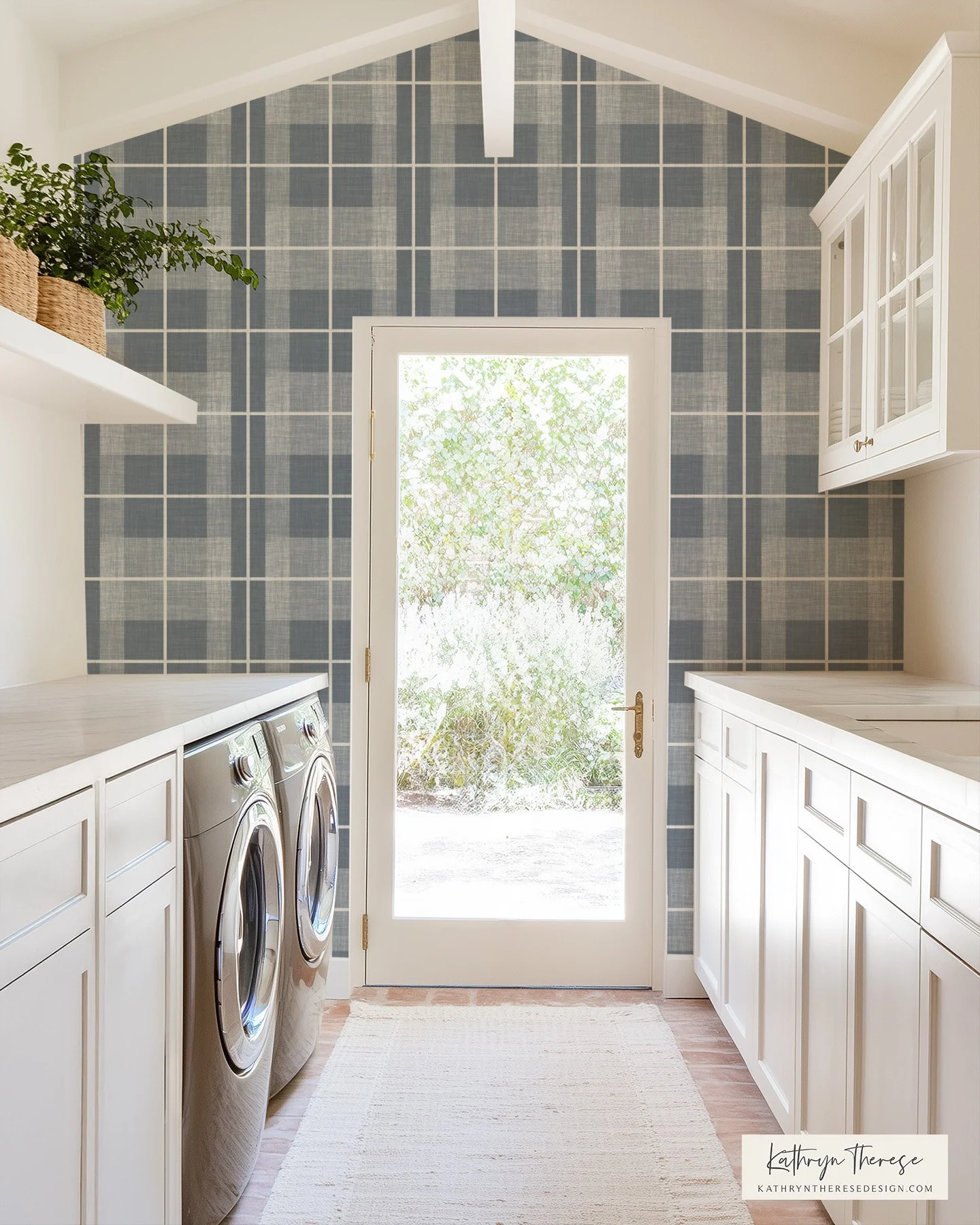 A laundry room with white cabinets, a washing machine and dryer, a glass door leading outside, a blue plaid wallpaper, a shelf with potted plants, and a light-colored rug.
