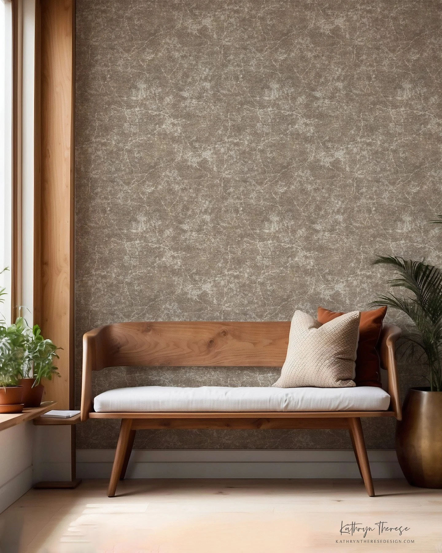 A living room with a minimalist wooden couch, beige cushions, a potted plant, and neutral-colored textured wall.