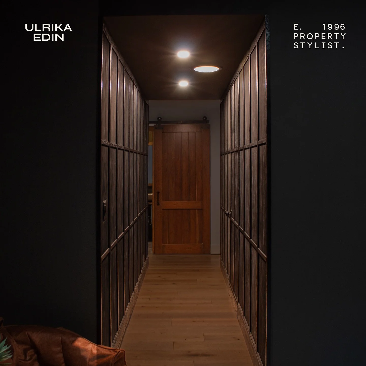 With custom built wood paneling and a discreetly integrated storage door, this moody hallway transforms an unconventional corner into a striking architectural statement. Defined by sleek lines, rich finishing, and dramatic atmosphere, the space exemp