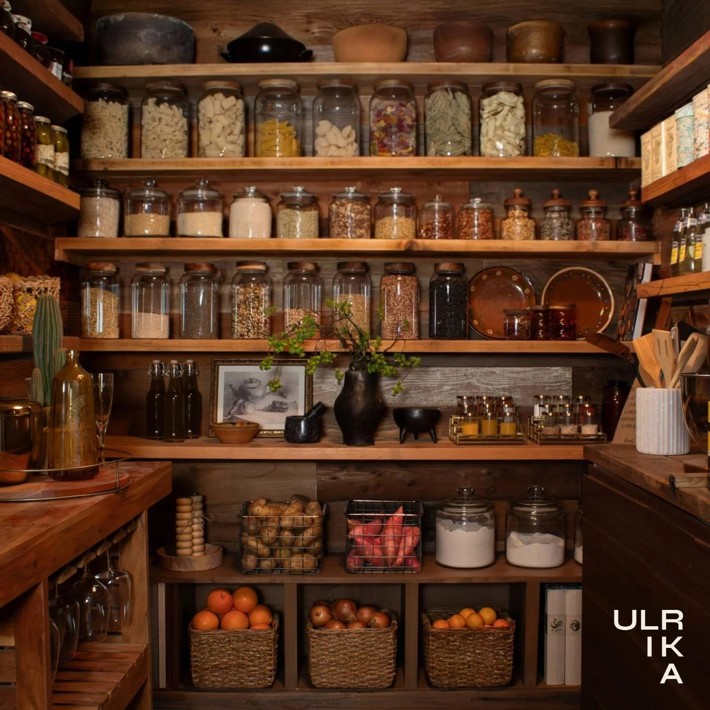We set out to design the dream pantry, and the before-and-after speaks for itself. What was once a simple storage area is now a beautifully curated extension of the home. Reclaimed wood adds a refined rustic touch, while custom-built-ins were crafted