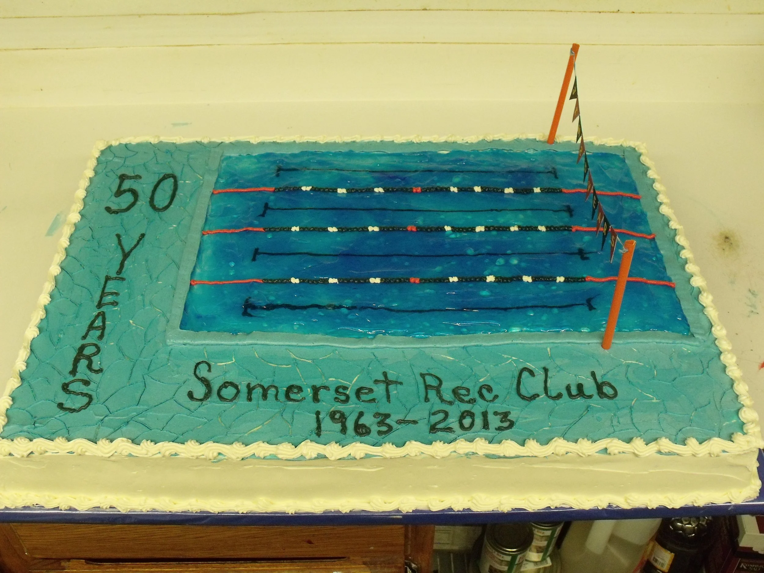 Replicated Olympic Swimming Pool Anniversary Cake