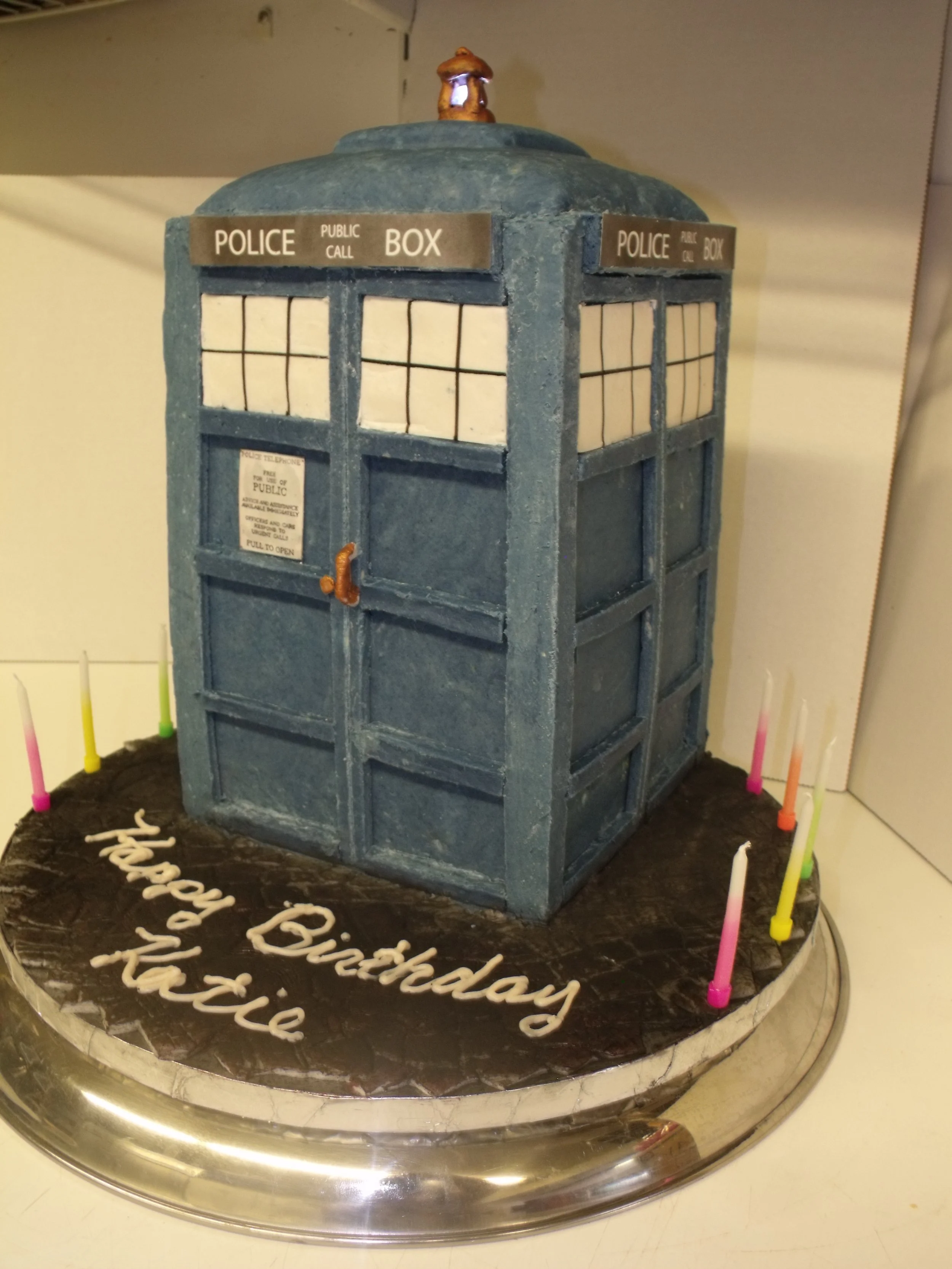 Dr Who Tardis Cake Sculpted Colored White Chocolate  Lighted Top Lamp One Foot Tall Happy Birthday Salutation Candles