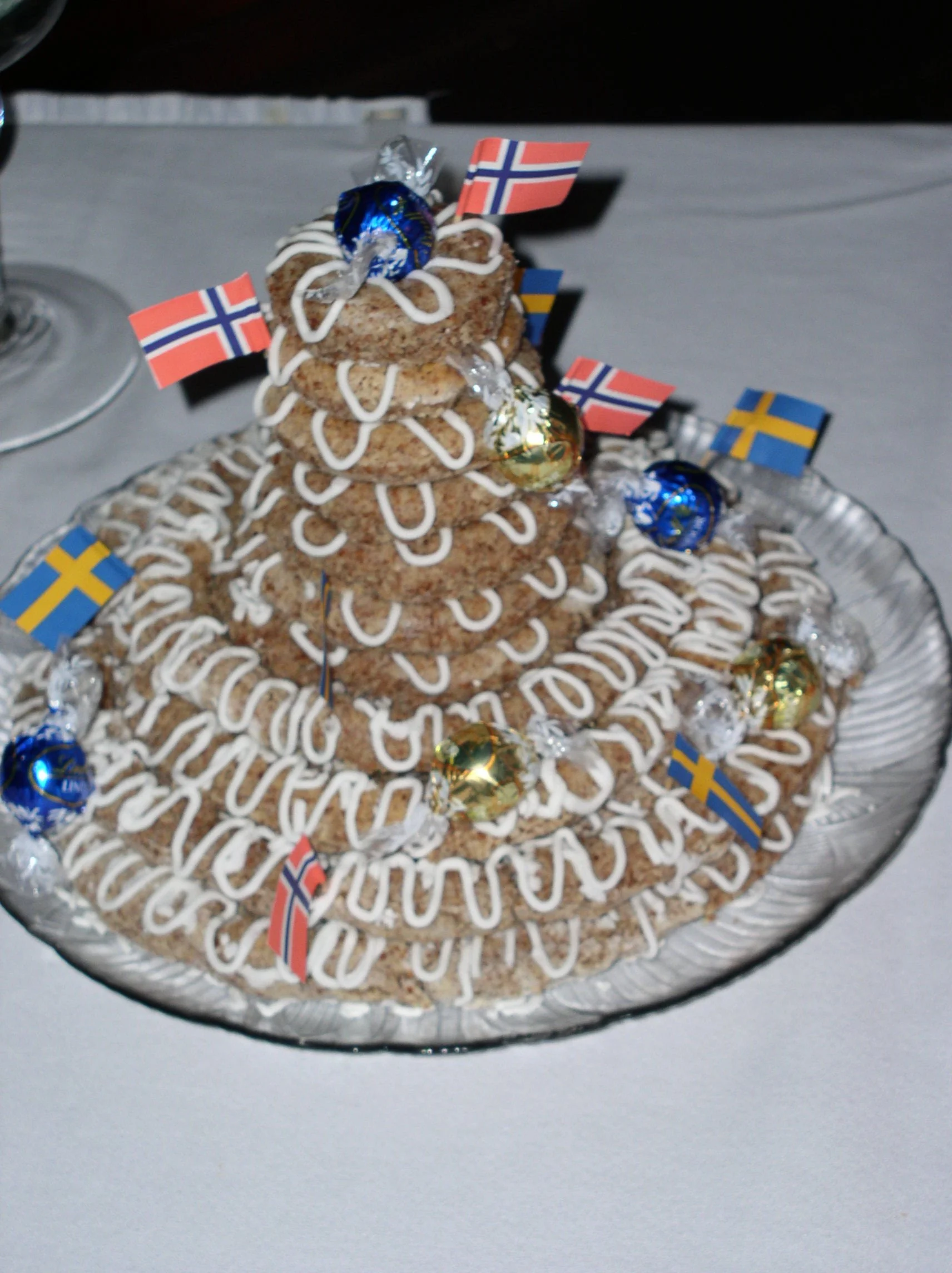 Swedish Ring Wedding Tiers Piped White Icing Wrapped Candy Paper Flags