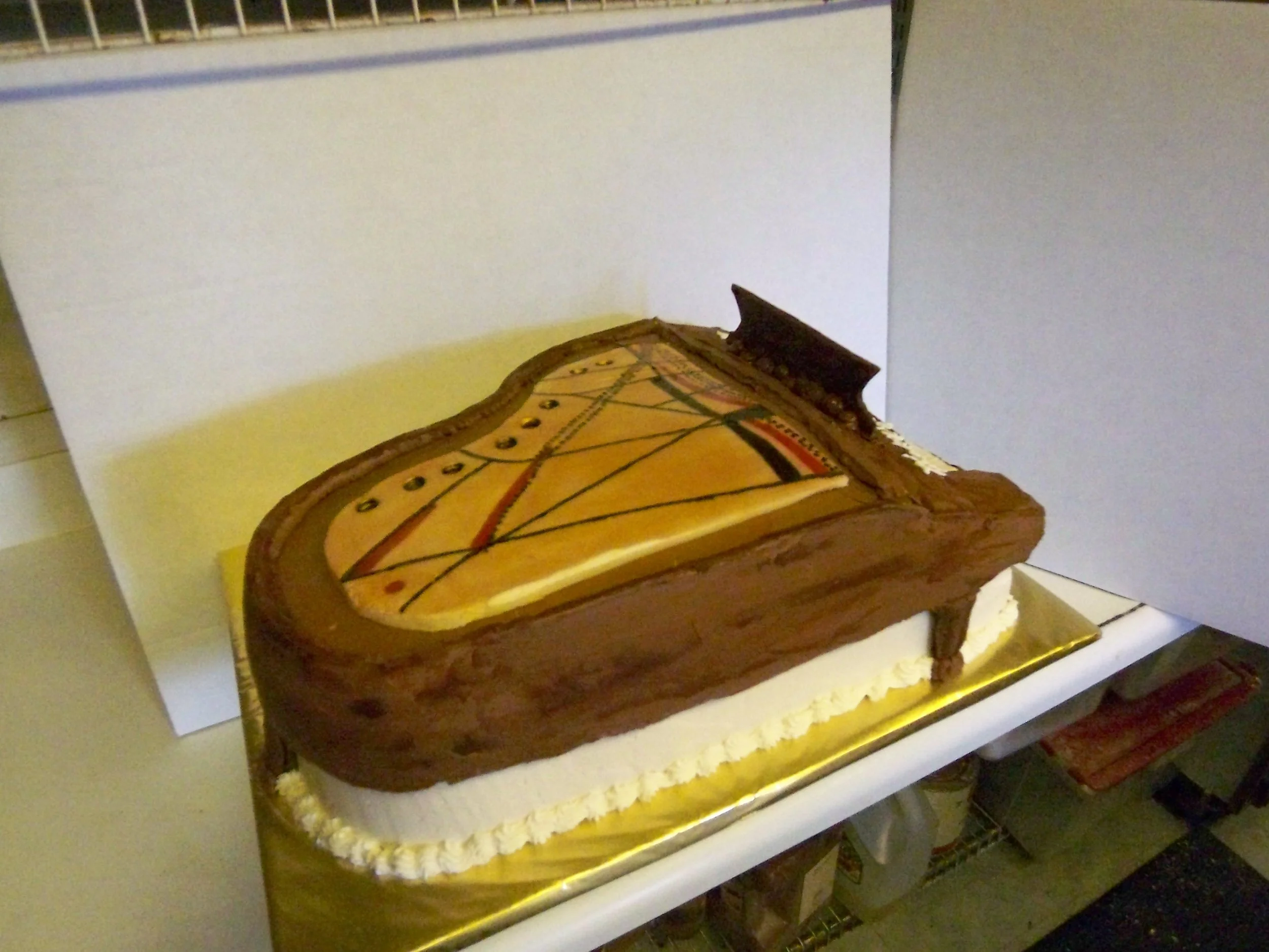 Three Dimensional Piano Cake frosted in two flavors buttercream with Fondant String Board Applique