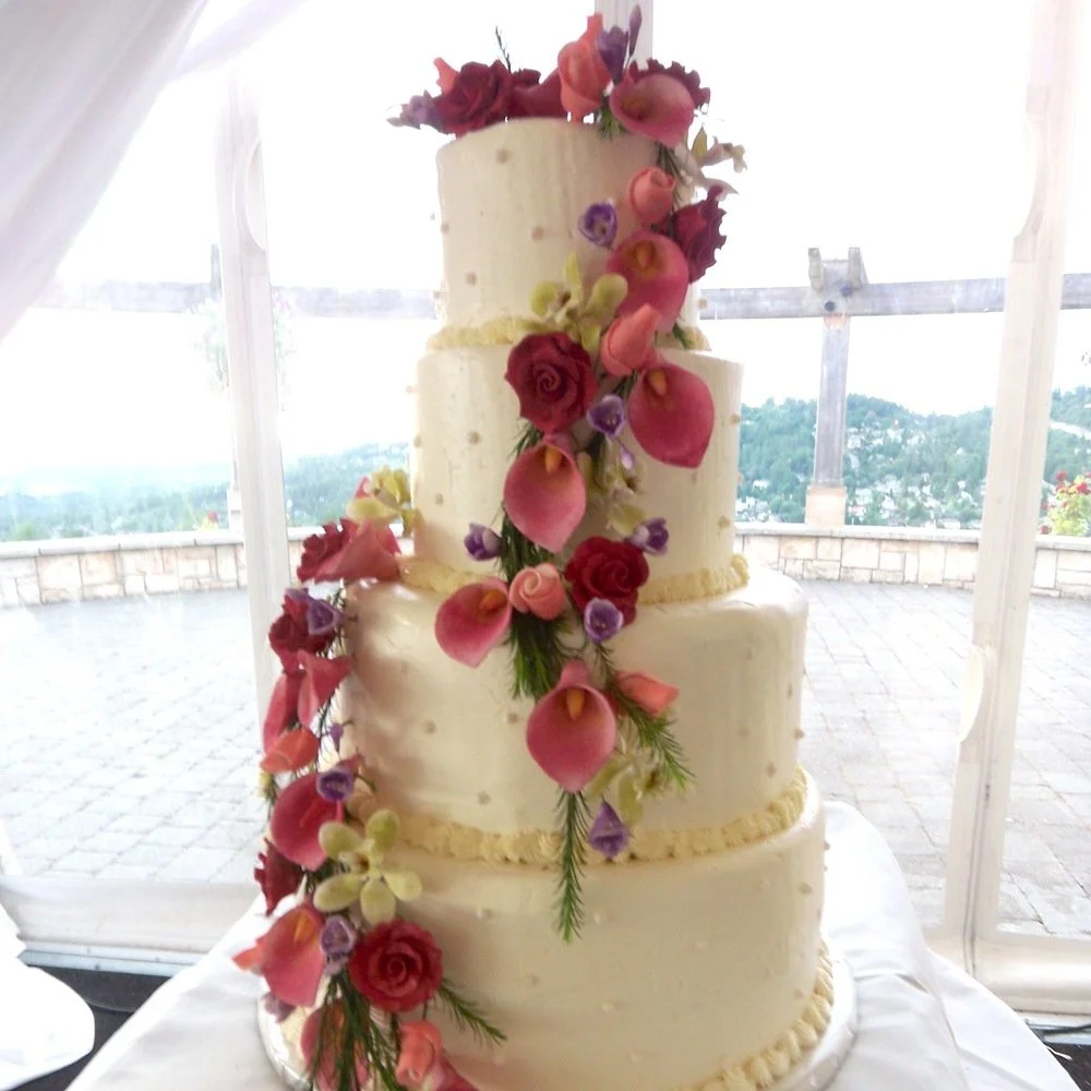 4-tier rounded-edge sugar-callas flowing cascade of flowers.jpg