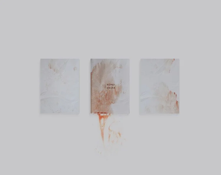 Three photographs of marble surfaces with red stains, with the middle photo having small black text that reads 'suite of 10' and a red stain dripping from the bottom.