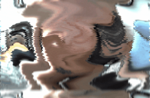 A distorted, wavy reflection of a person in water with a mix of skin tones and clothing colors.