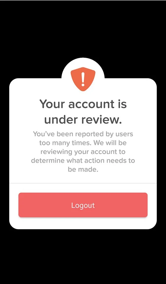 Mobile device screen displaying a warning message that an account is under review due to multiple reports, with a red Logout button at the bottom.