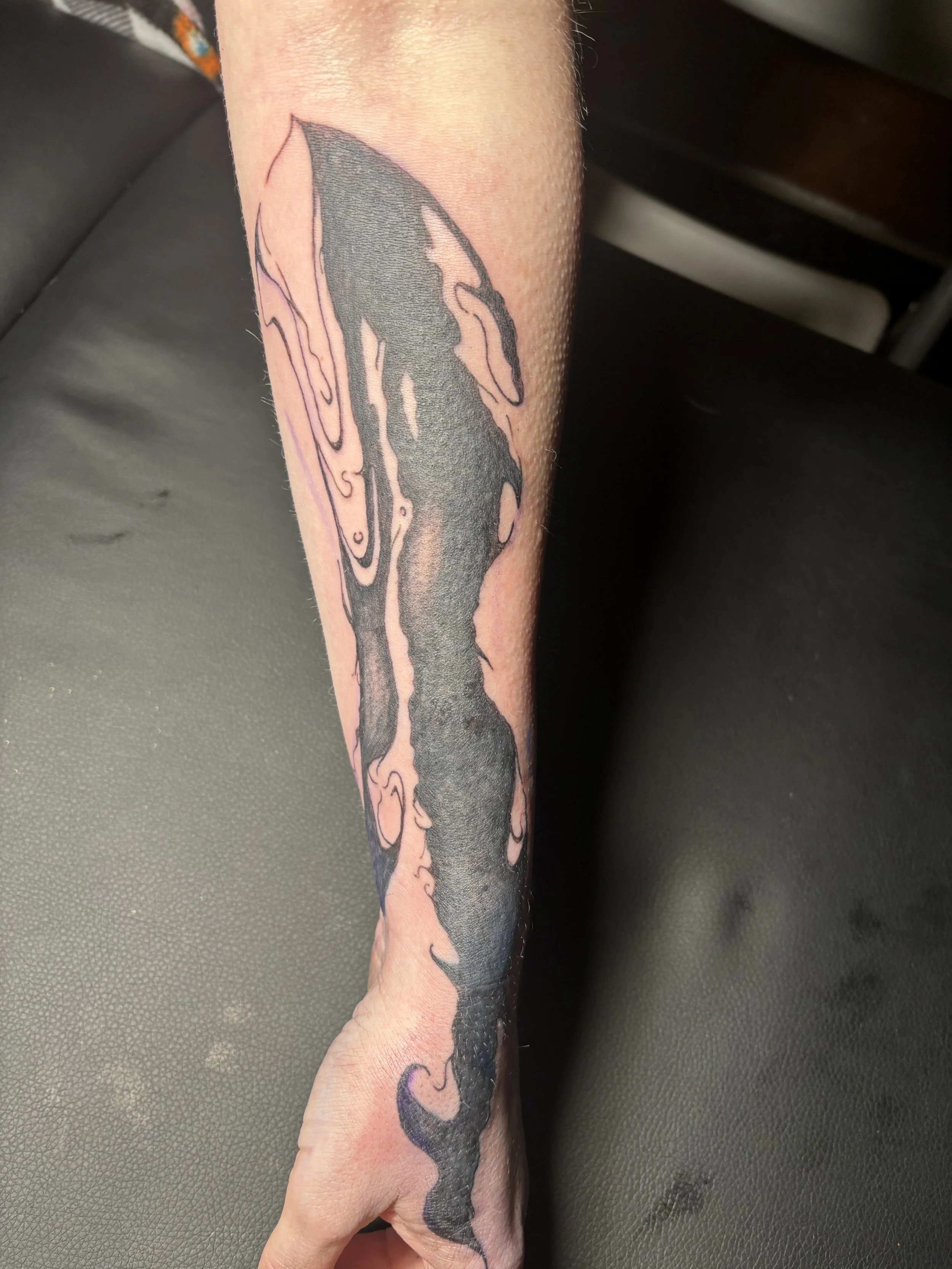 abstract coverup blackwork tattoo