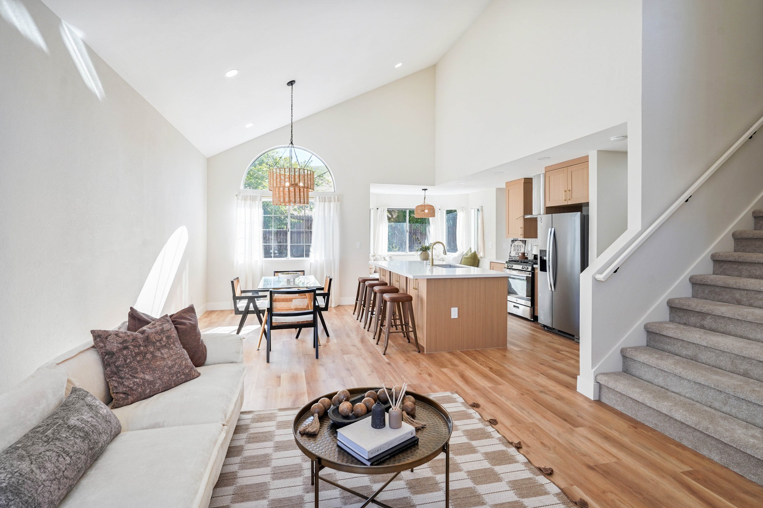AFTER | Bright open-concept living, dining, and kitchen