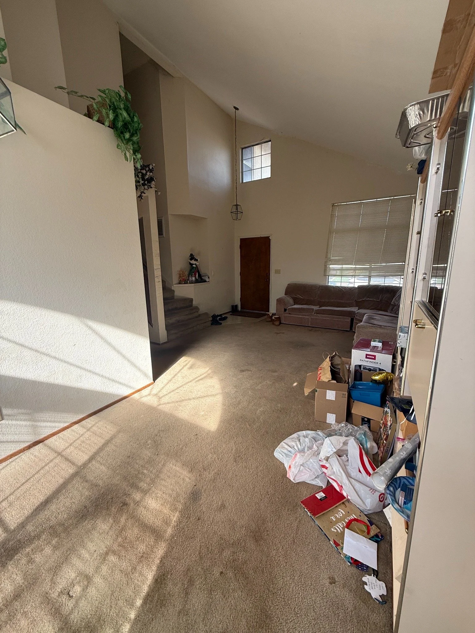 BEFORE | Closed-off living and dining area