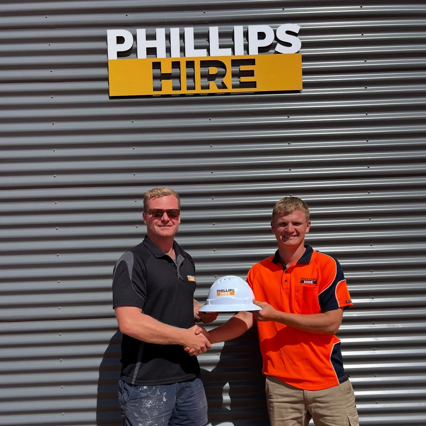 Meet Ronan, 

Pictured here with our director Matt, being handed his first ever hard-hat!

While recently completing year 12, Ronan would come in after school and help around the yard, assisting our drivers with loading trucks, maintenance, cleaning 