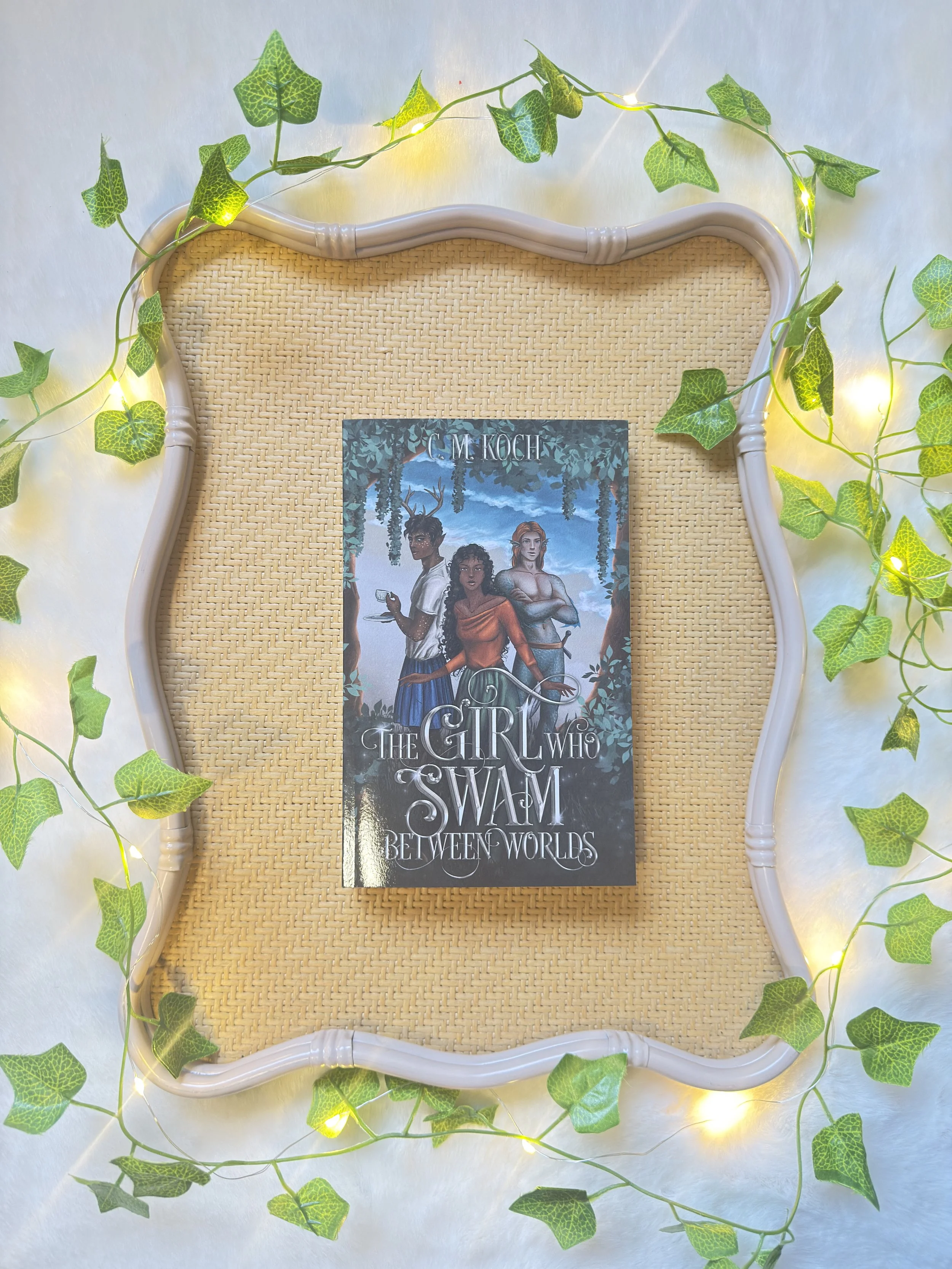 The Girl Who Swam Between Worlds by C. M Koch