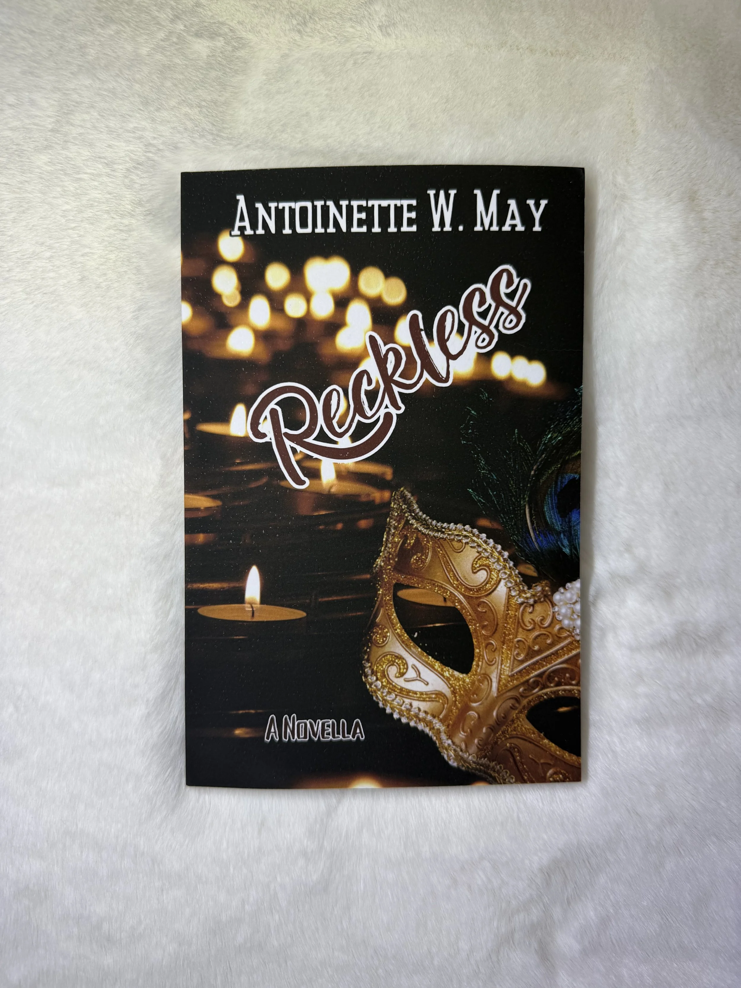 Reckless by Antoinette W May