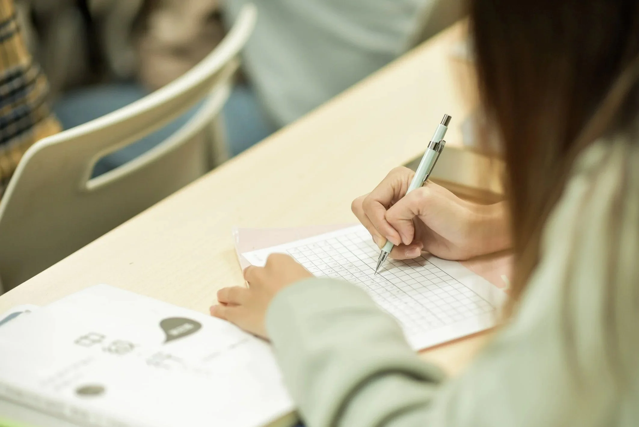 Kyoto Minsai Japanese Language School 京都民際日本語学校 student writing short essay