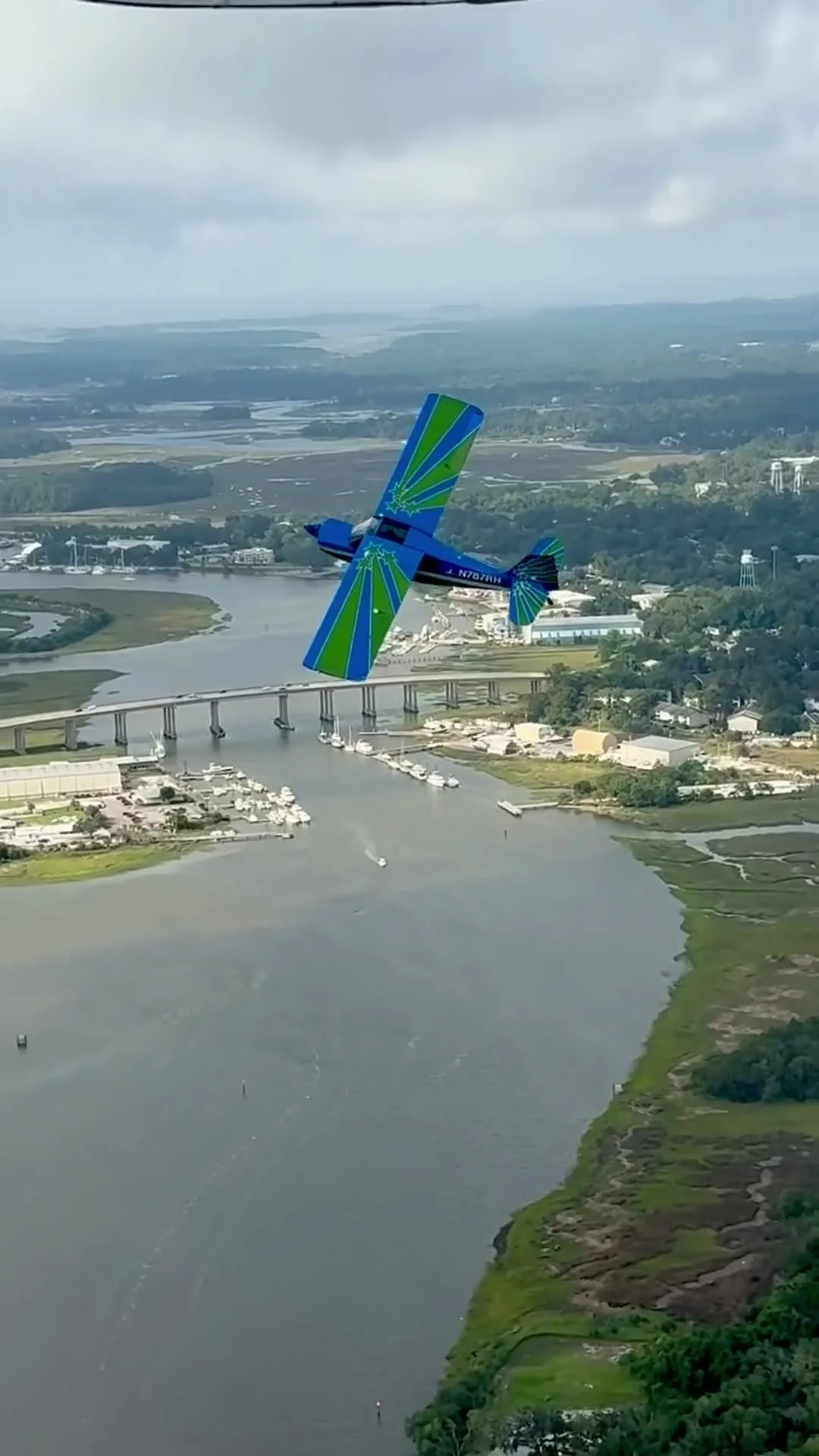 Lowcountry Flight Company plane flying over a river