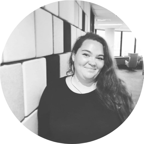 Black and white portrait of Rangimarie Sophie Jolley smiling, facing the camera