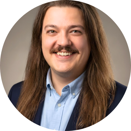 Portrait of Rylee Ahnen wearing a blue shirt and suit jacket