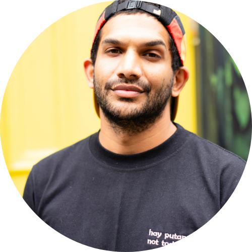 Portrait of Jordan Wimbis smiling, facing the camera.