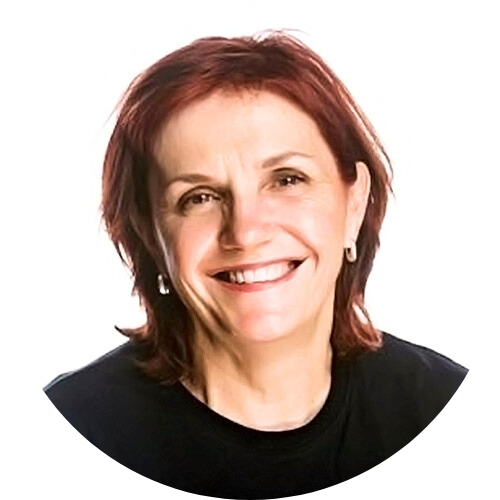 Jo Schofield smiles at camera against transparent background.