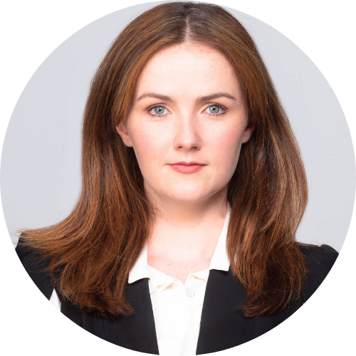 Portrait of Alison Pennington wearing a white shirt and black blazer
