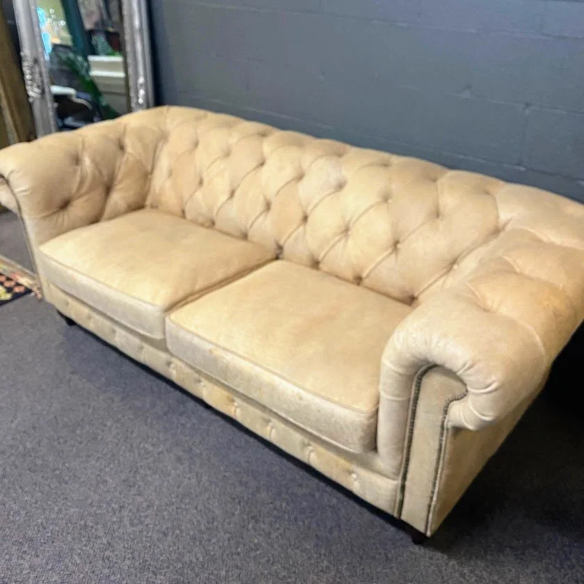 Destroyed camel sofa.jpg