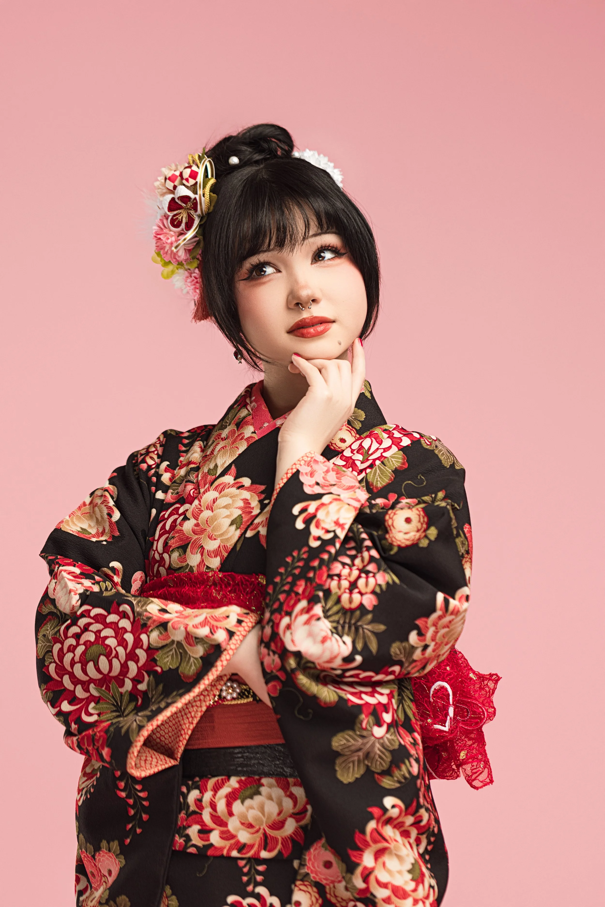 Studio portrait of a young woman in a floral kimono during a coming of age photography session in Kirkland.