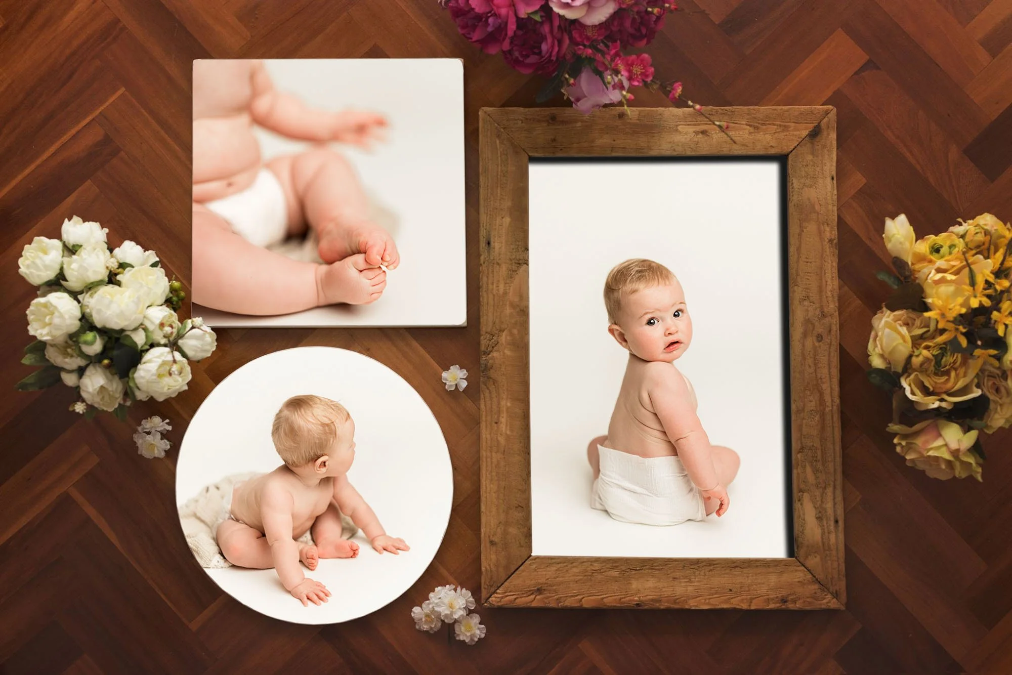 Framed and fine art prints from a 5–6 month baby milestone photography session displayed as wall art.