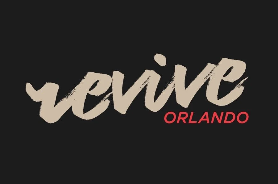 The word 'revive' in large, beige, brushstroke-style font with the word 'ORLANDO' in smaller, red font below it, on a black background.