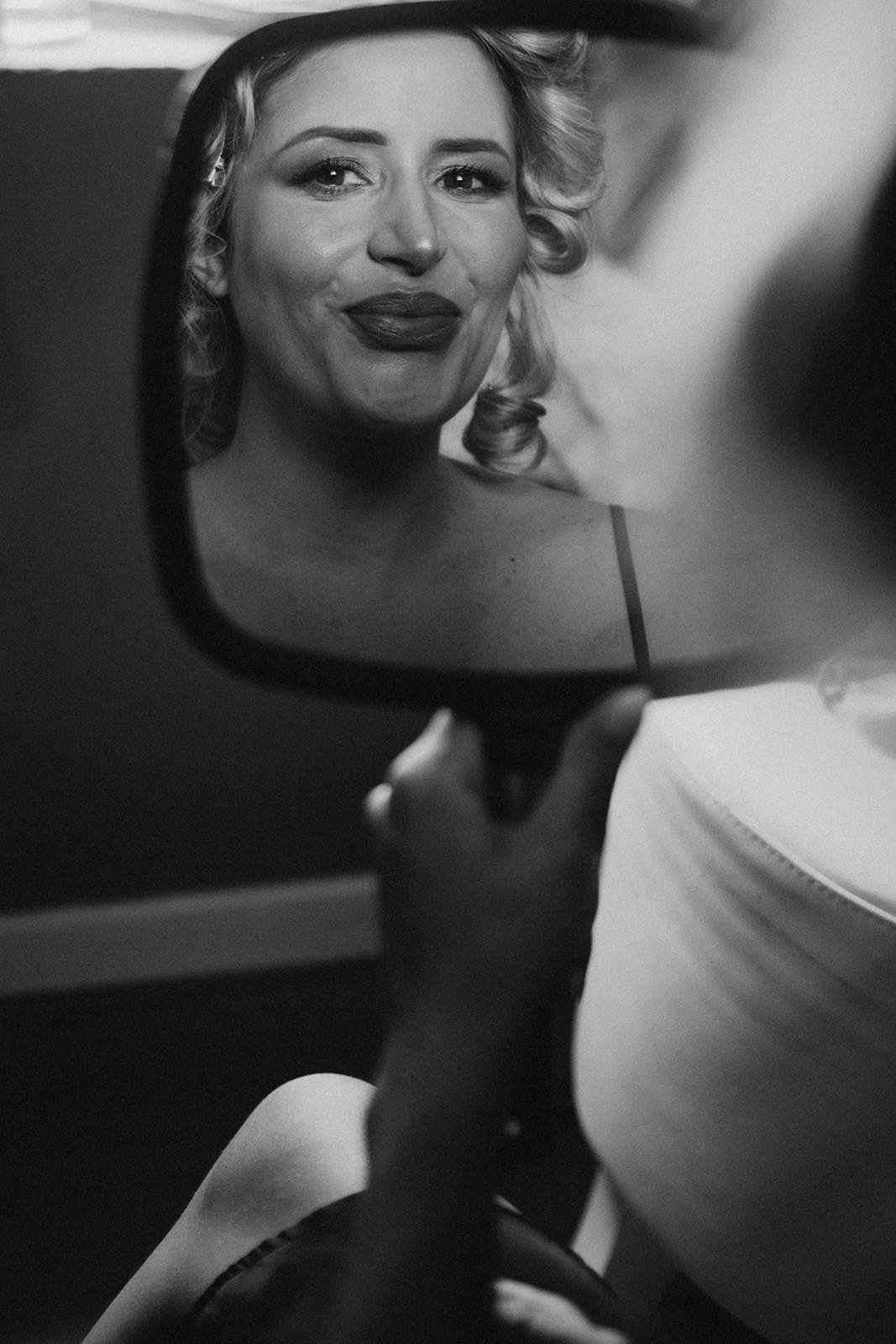Bride makeup in a close-up black and white photo.