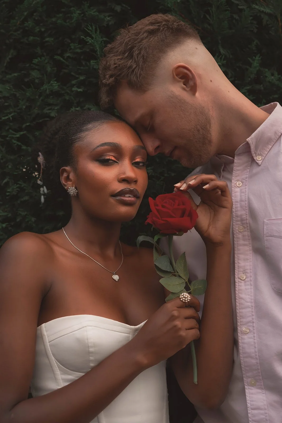 Moody Romantic Bride with a Red Rose