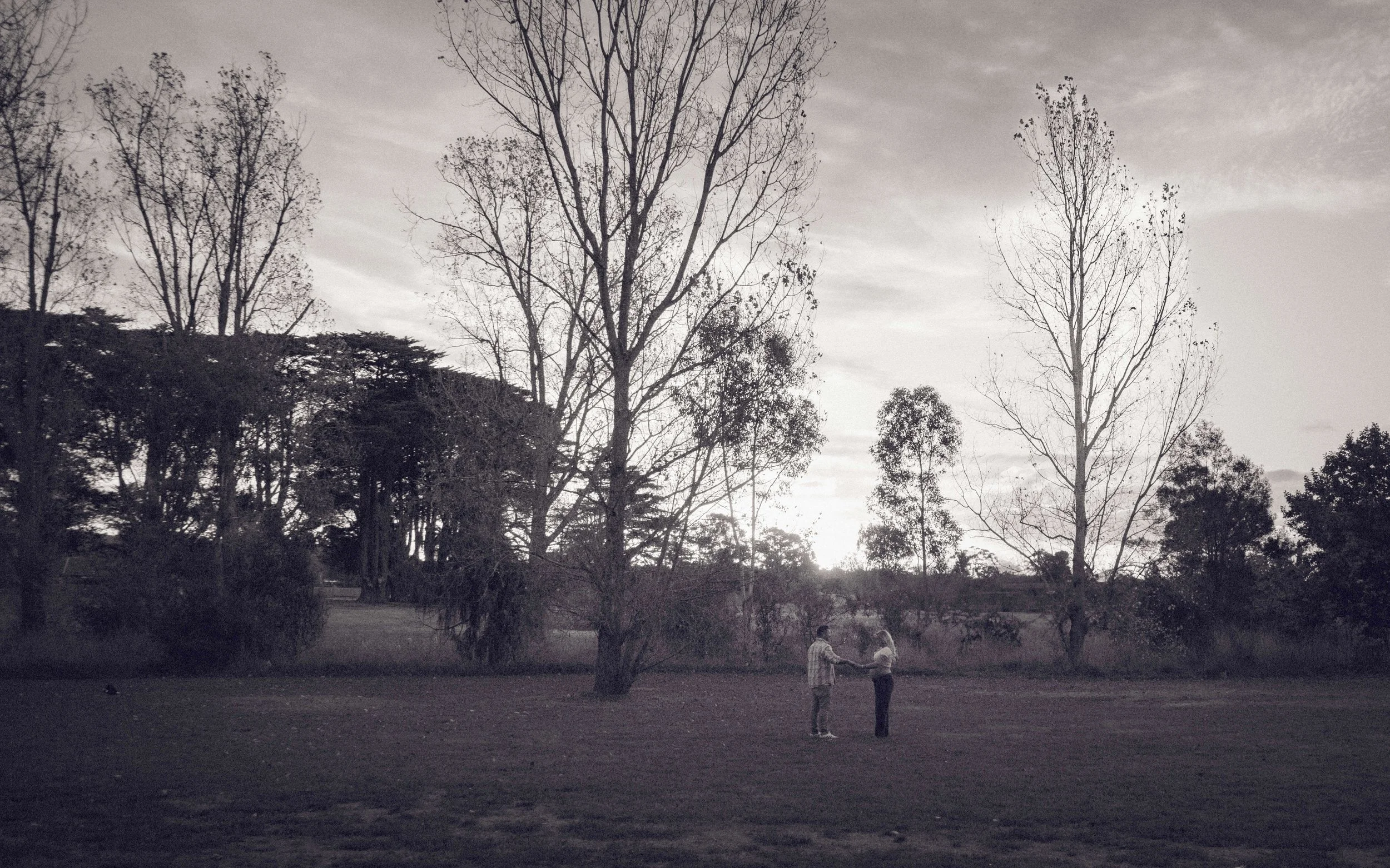 Black and white maternity engagement session photo shoot Melbourne wedding photographer Australian photographer cinematic fun loving couple pregnant belly love holding hands