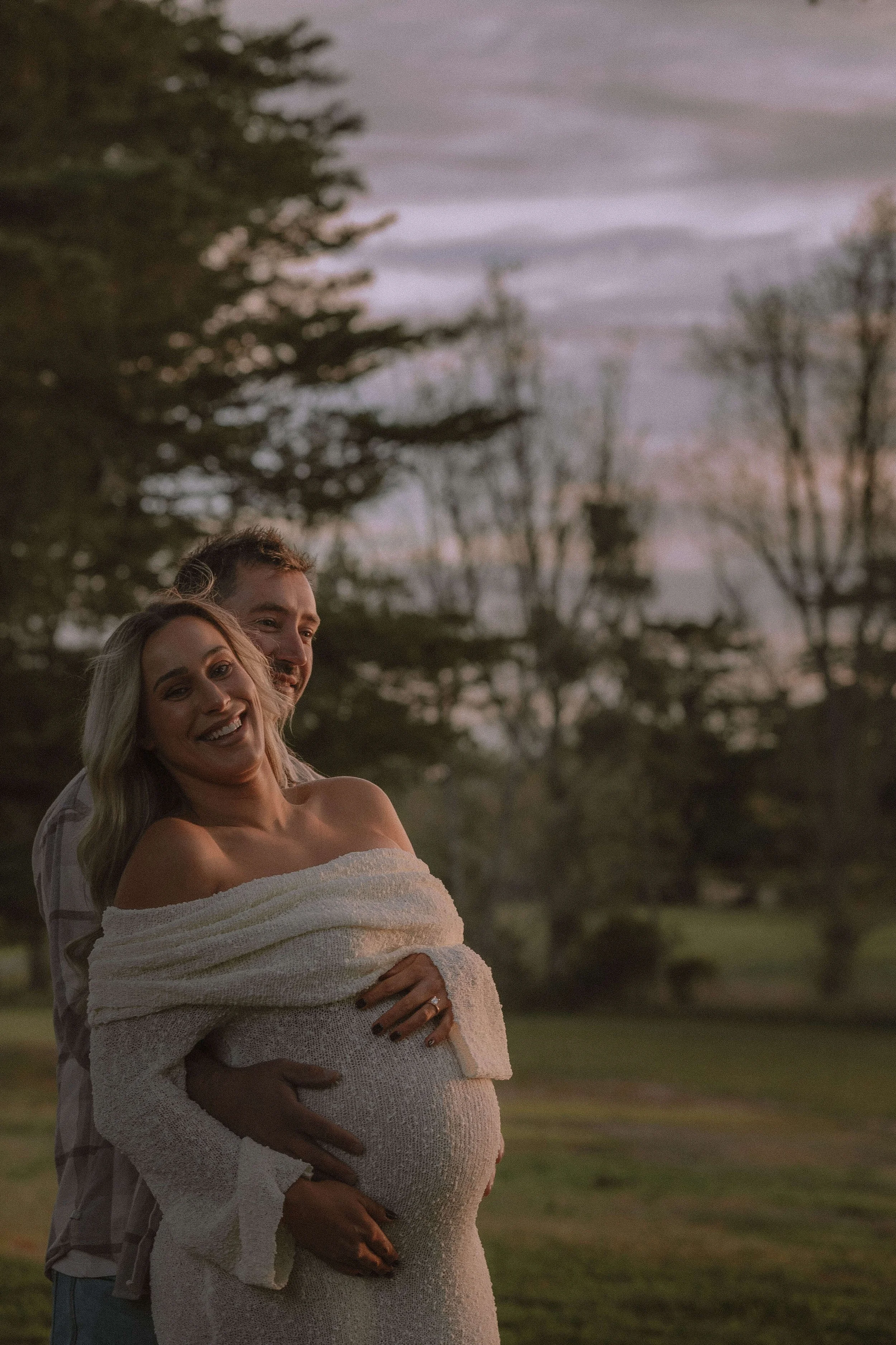 maternity engagement session photo shoot Melbourne wedding photographer Australian photographer cinematic fun loving couple pregnant belly love bride to be groom park forest joy 