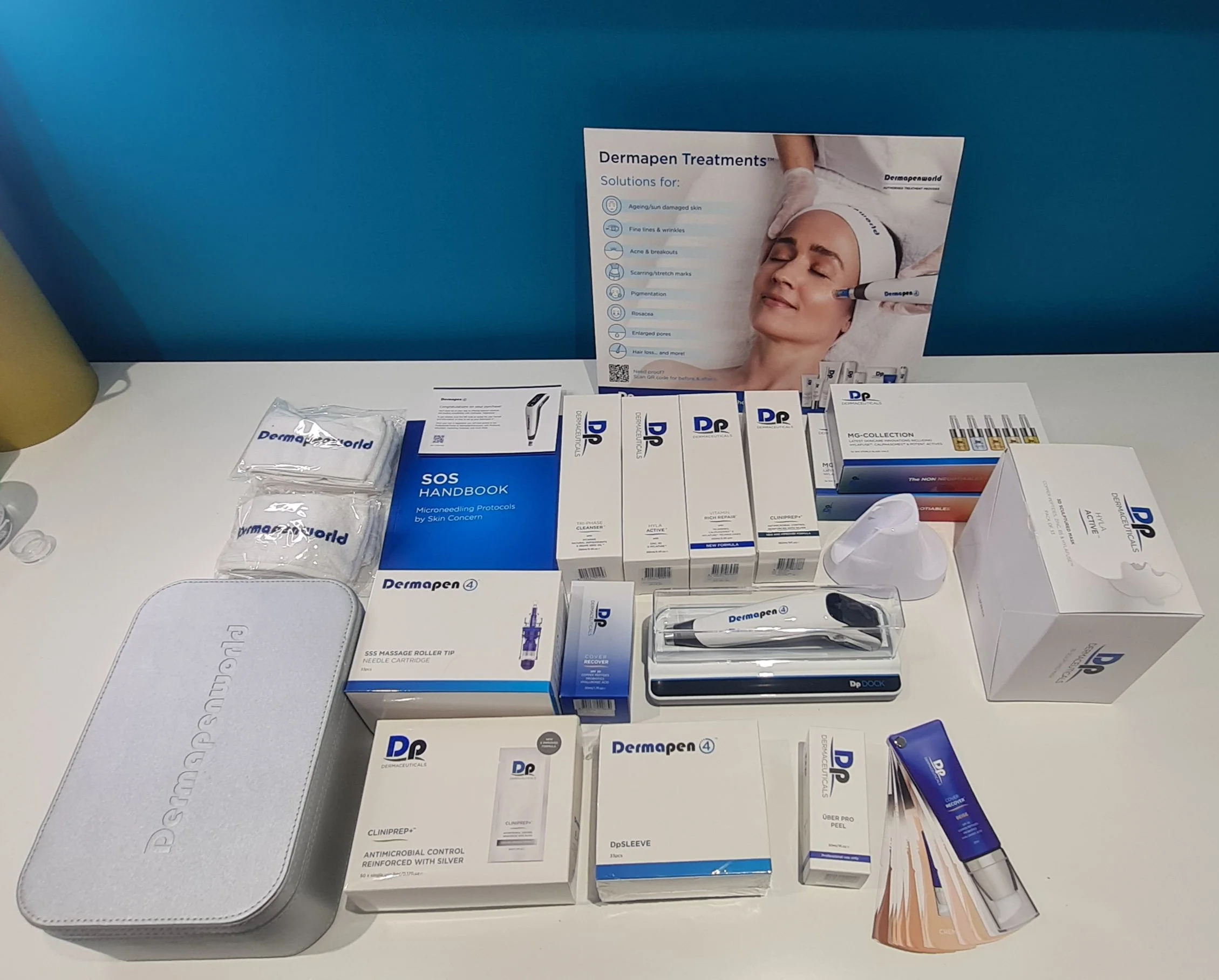 Display of Dermapen4 microneedling skin care products and professional skin treatment setup
