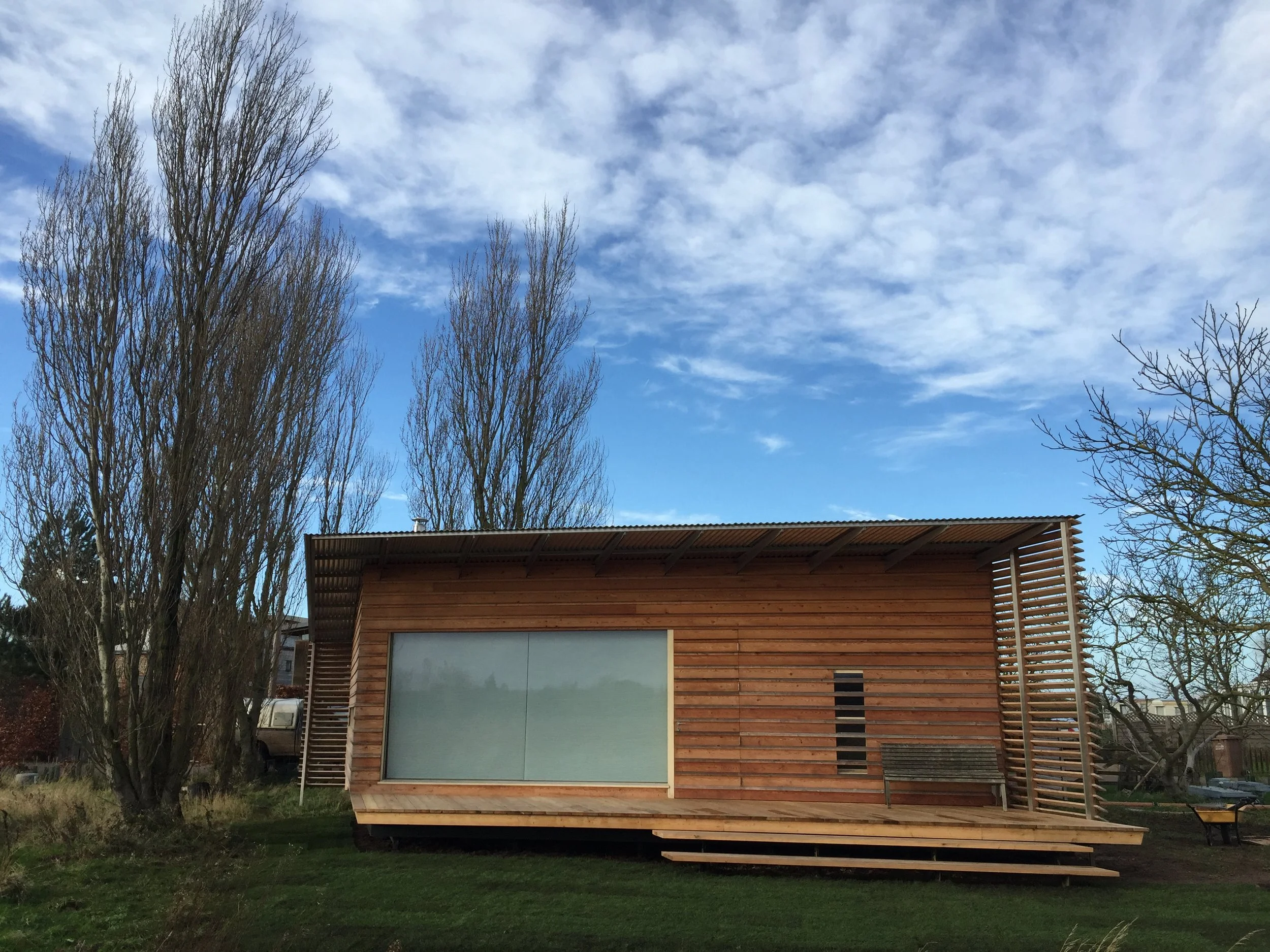 Douglas fir with larch cladding and robust louvers to soften the elevations