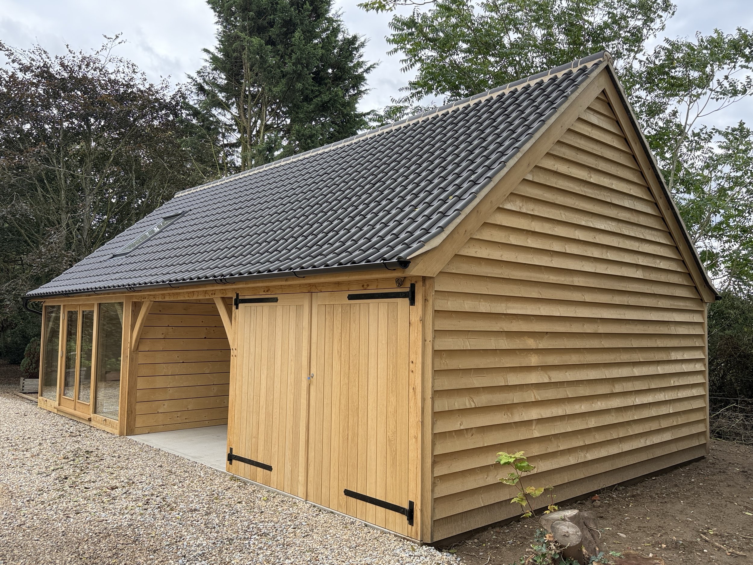 Oak two bay garage with vaulted studio