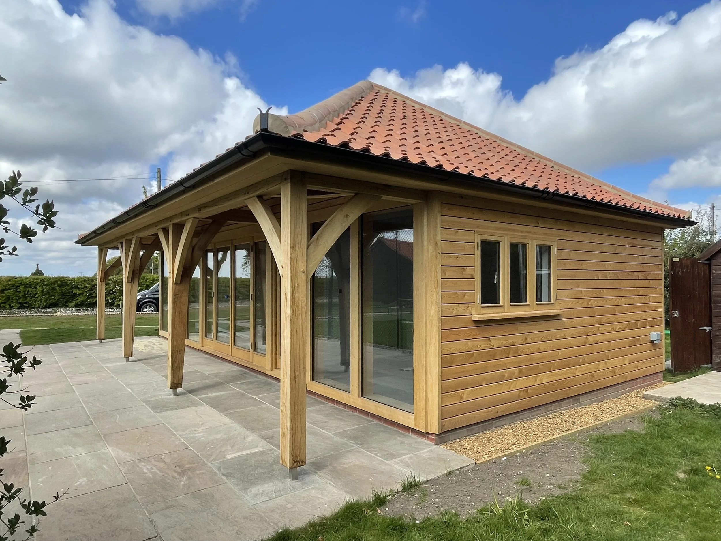 Oak framed, larch rainscreen cladding