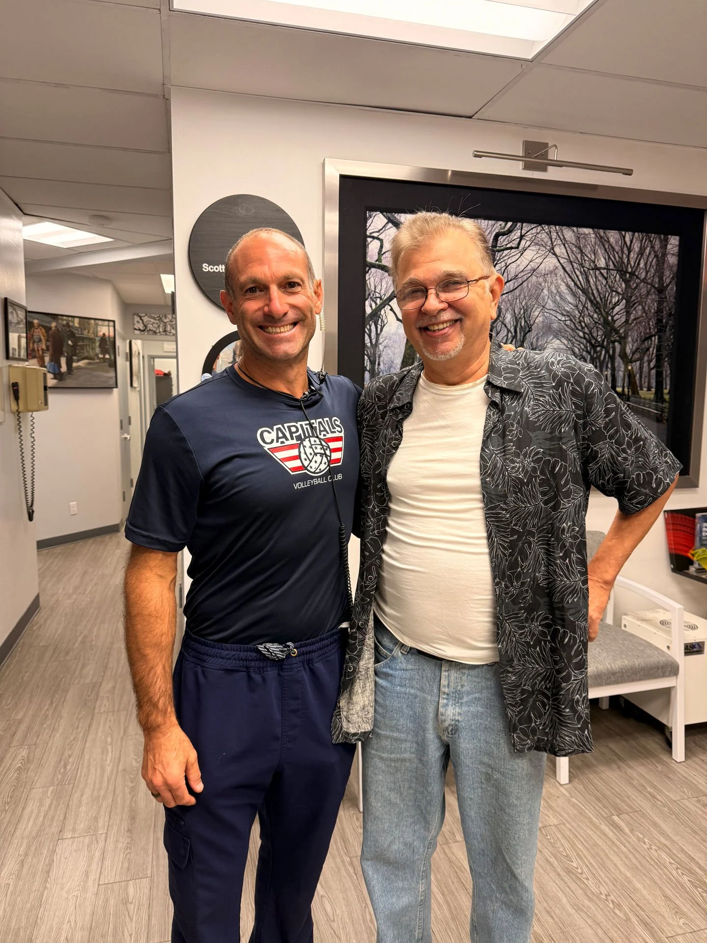 dr. scott froum with a happy implant patient in nyc