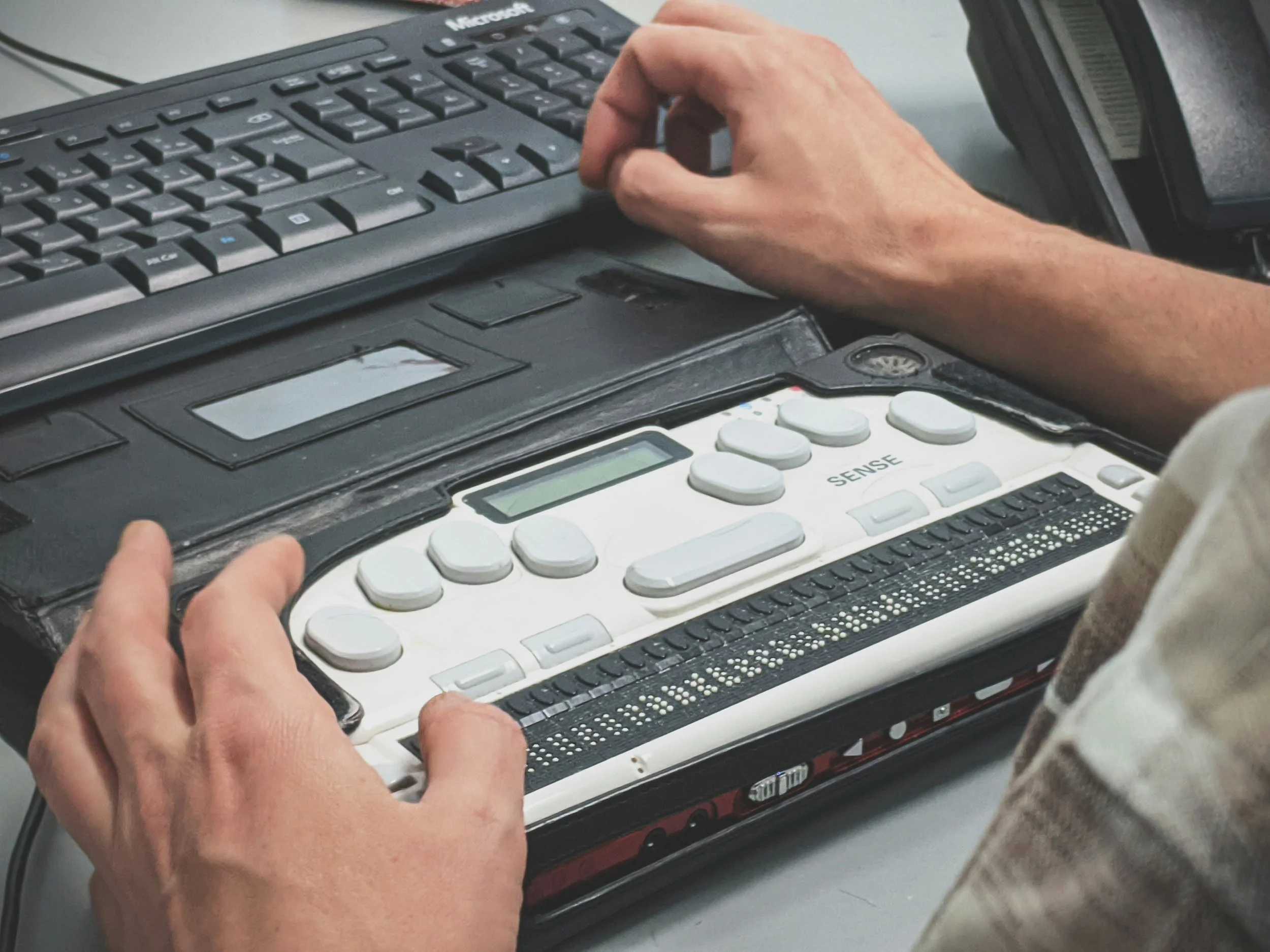 Using braille display with computer.