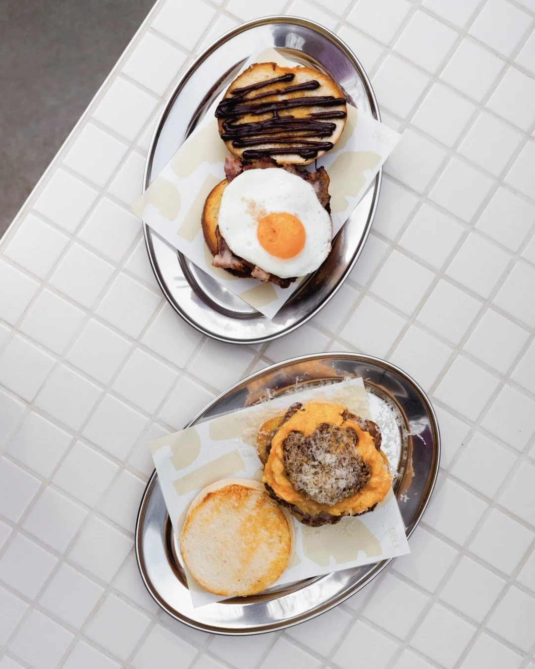 Choose your fighter&hellip;

Bacon &amp; Egg Bun
crispy bacon &amp; fried egg served on a pretzel
bun with house made HP or chipotle ketchup

Pork &amp; Fennel Muffin
with folded egg, hash brown, chipotle &amp; apple
ketchup and grated lincolnshire p