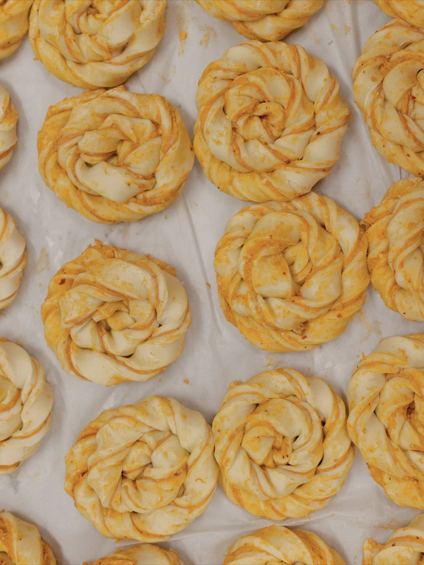 Twisted, tangled and ready for the oven. Our Spanakopita Knot with spinach, ricotta &amp; cream cheese filling, made fresh every morning.