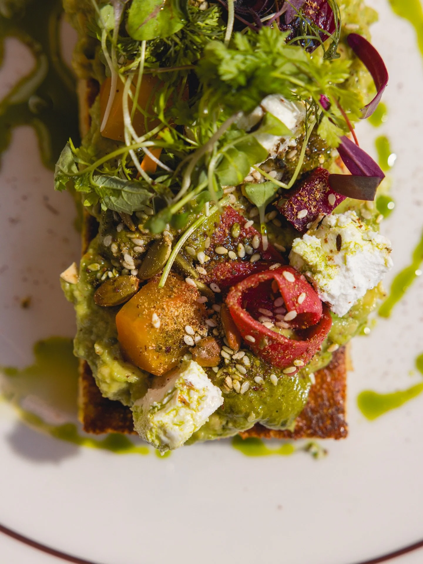 Avocado Toast. The summer edition.

served on toasted sourdough with pickled
beetroot and rhubarb, chermoula &amp; persian feta