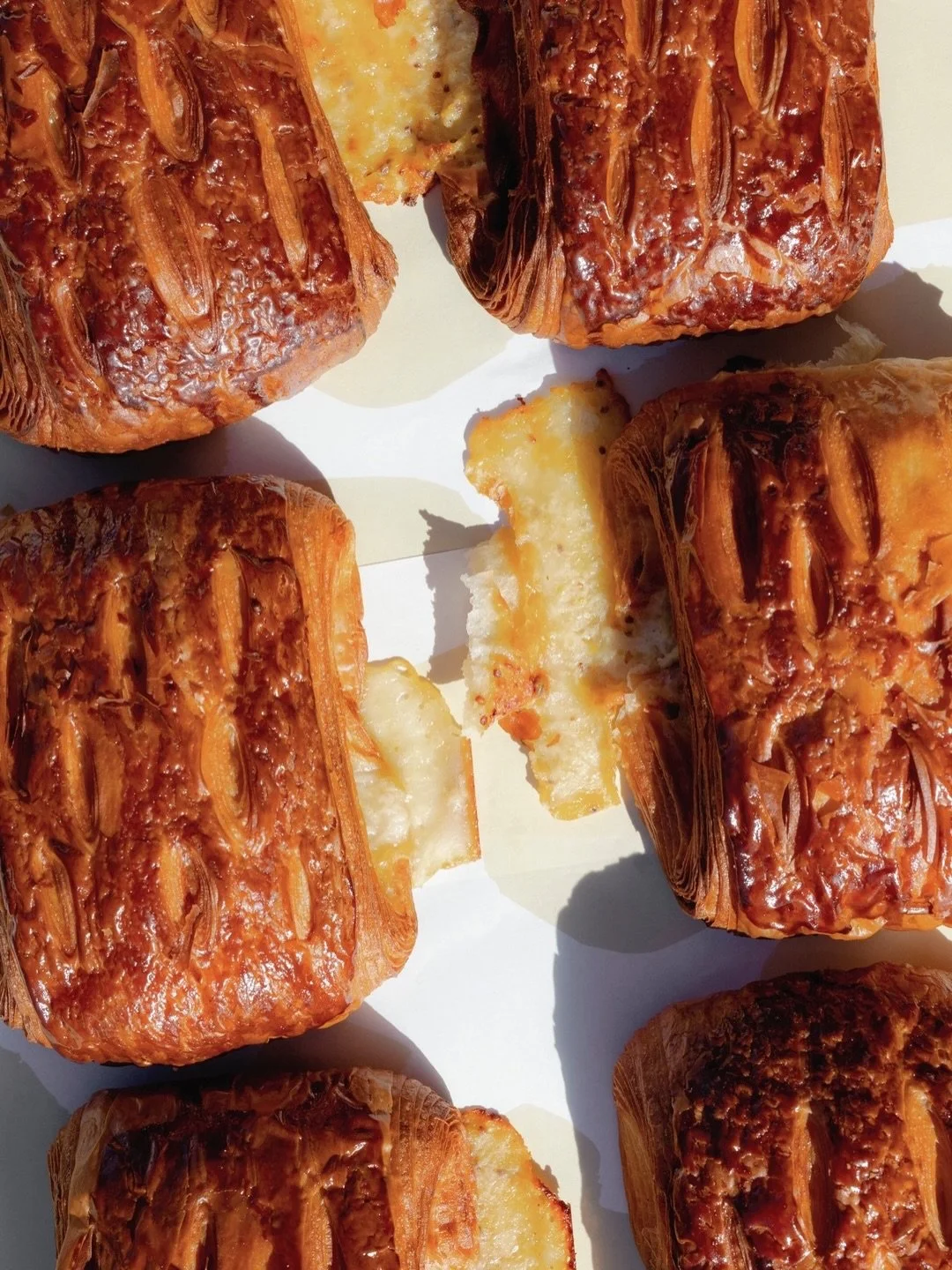 The classics, the Side Piece way.

Deep golden layers, rich almond, and ham &amp; cheese with a little extra.